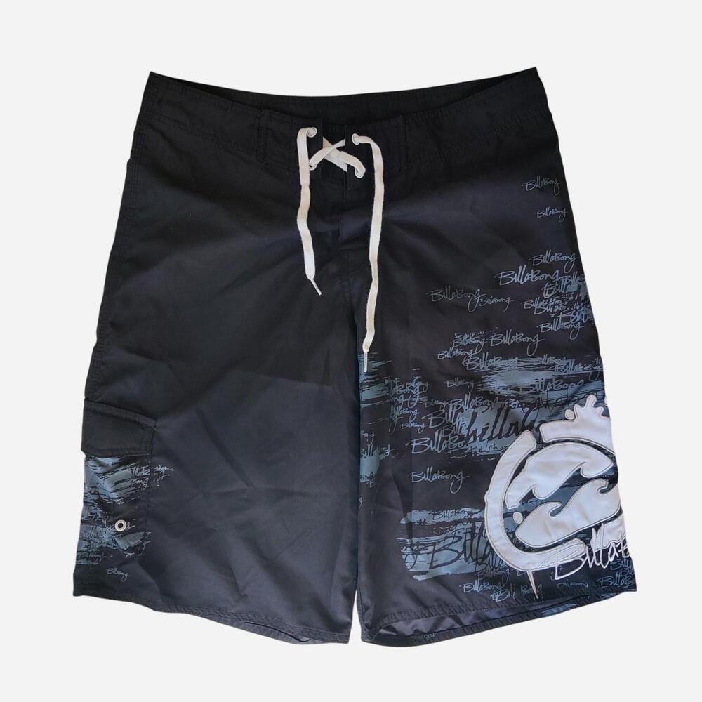 Y2K Billabong board shorts with white graffiti-style text and logo